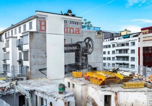 Zoug: la démolition d'une maison dévoile une publicité monumentale
