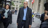 Swiss Islamic scholar Tariq Ramadan (center) leaves the Geneva courthouse with his lawyers Yael Hayat (left) and Nabila Asmane (right) at the start of the appeal trial as part of a sexual assault investigation, in Geneva, Switzerland, Monday, May 27, 2024. (KEYSTONE/Valentin Flauraud)