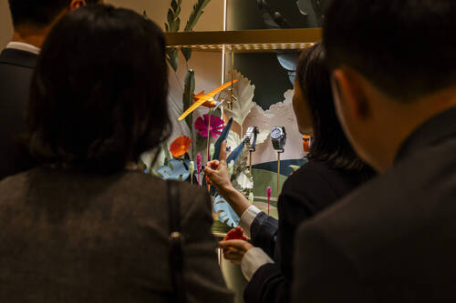 Visitors look watches at the Swiss watch manufacturer Vacheron Constantin stand, during the opening day of the "Watches and Wonders Geneva" luxury watch fair, in Geneva, Switzerland, Tuesday, April 14, 2026. (KEYSTONE/Salvatore Di Nolfi)