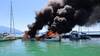 Bateaux ravagés par les flammes dans le port de Zoug