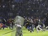 Bilan révisé à 125 morts après un mouvement de foule dans un stade