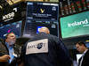 Wall Street ouvre en baisse, un oeil inquiet sur les banques