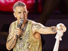 La pop star Robbie Williams offre ses services comme manifestant
