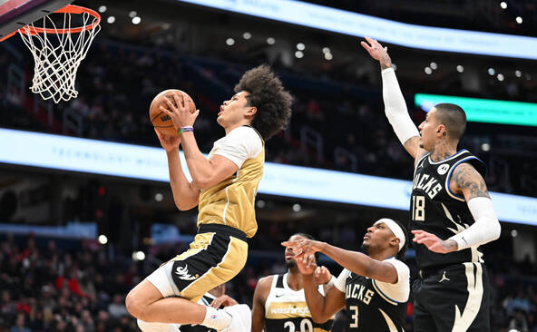 Kyshawn George mène Washington à la victoire