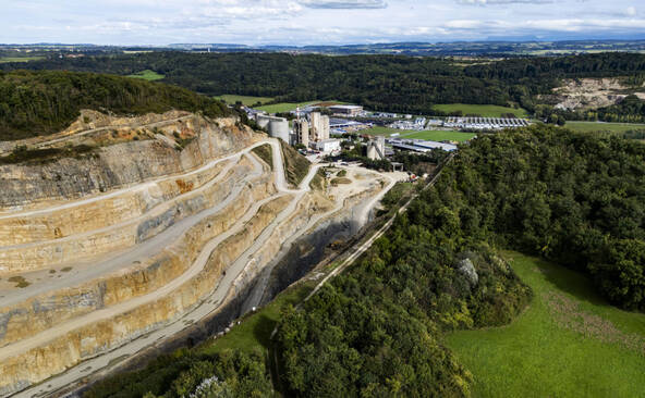 Holcim avance au 3e trimestre et relève ses ambitions